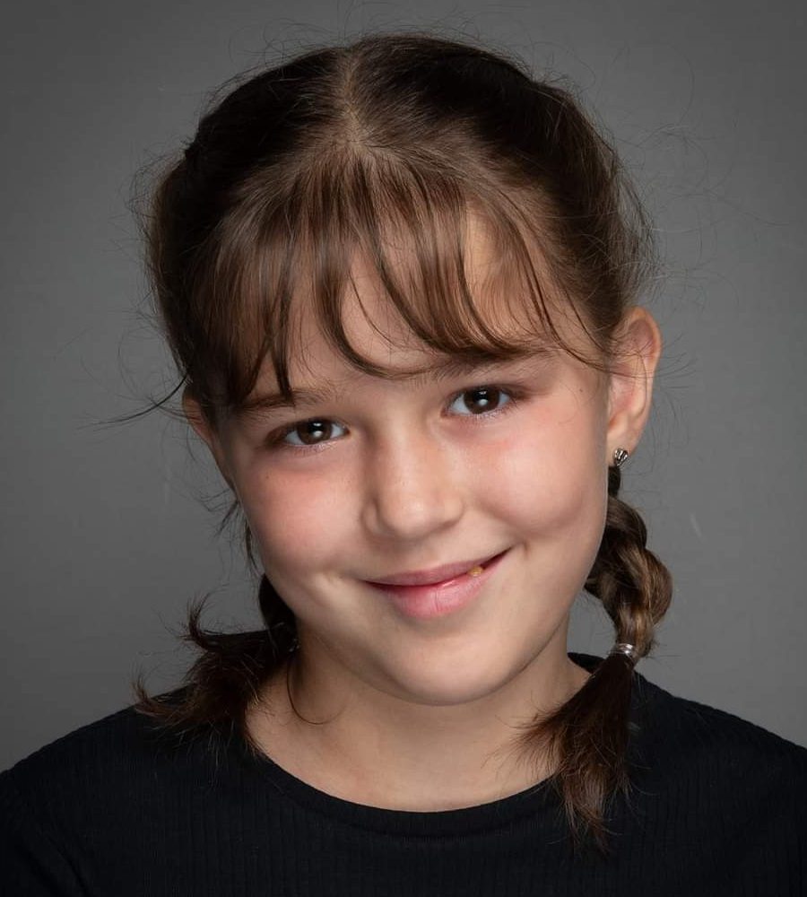 Professional headshot of Rosie Wood