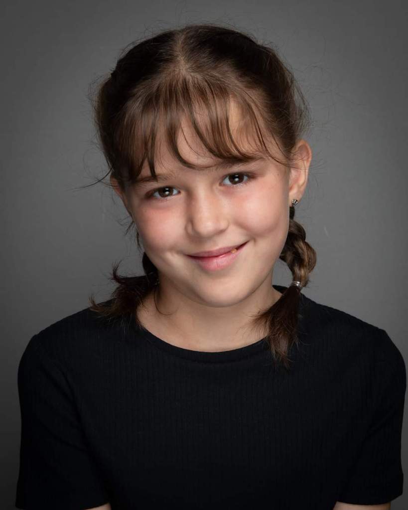 Professional headshot of Rosie Wood